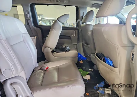 2013 Honda Odyssey Touring z USA, uszkodzony, nr VIN 5FNRL5H9XDB018835